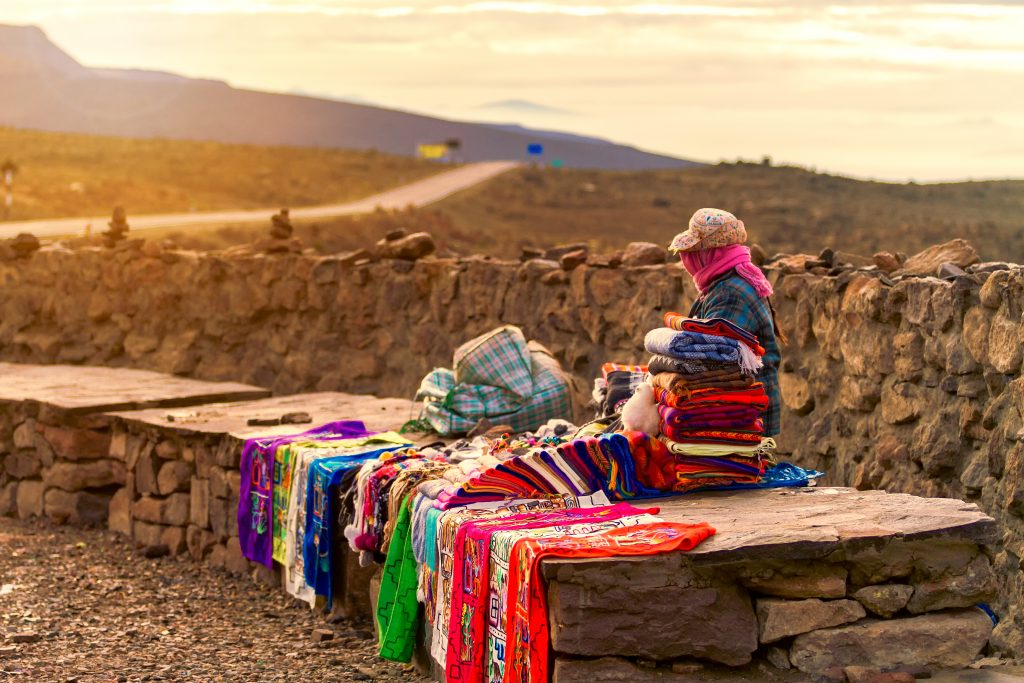 Arequipa street vendor selling souveniers credit shutterstock