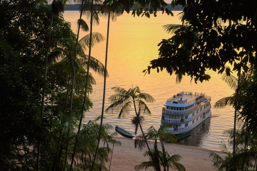 Boat in the river in the Amazon rainforest