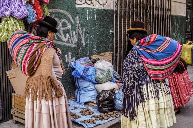 Native women in traditional dress in the market