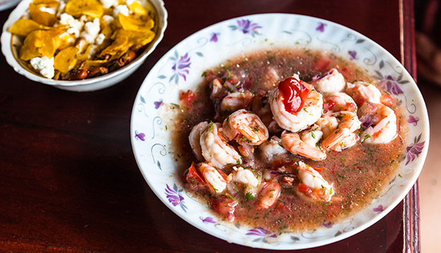 Shrimp ceviche, Ecuadorian traditional dish prepared with orange juice lemon and tomato