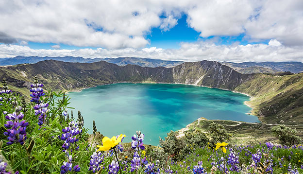 Beautiful panoramic scenery overlooking at Quilotoa lake at the crater rim in Quilotoa, Ecuador