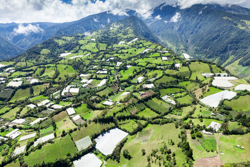 Banos de Agua Santa and Tungurahua Volcano in the background in Ecuador