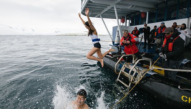 Antarctica Activities: plunging into the icy Antarctic waters.